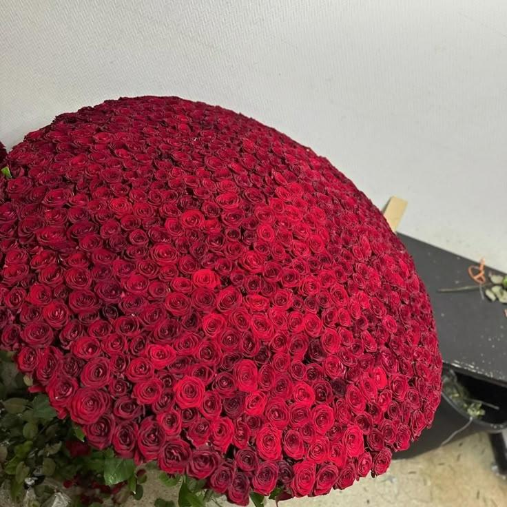 Corporate meeting room with carefully timed floral arrangements that maintain elegance throughout business hours